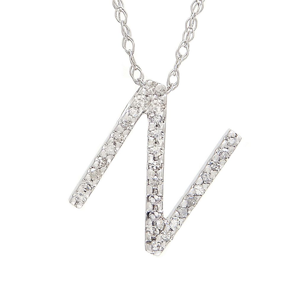 14k Diamond Initial Pendants. Available in White or Yellow Gold